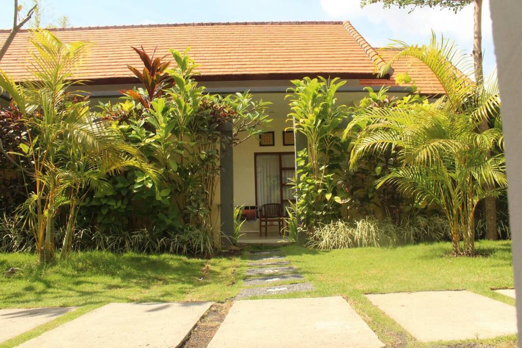 Purnama Guesthouse Canggu Екстериор снимка