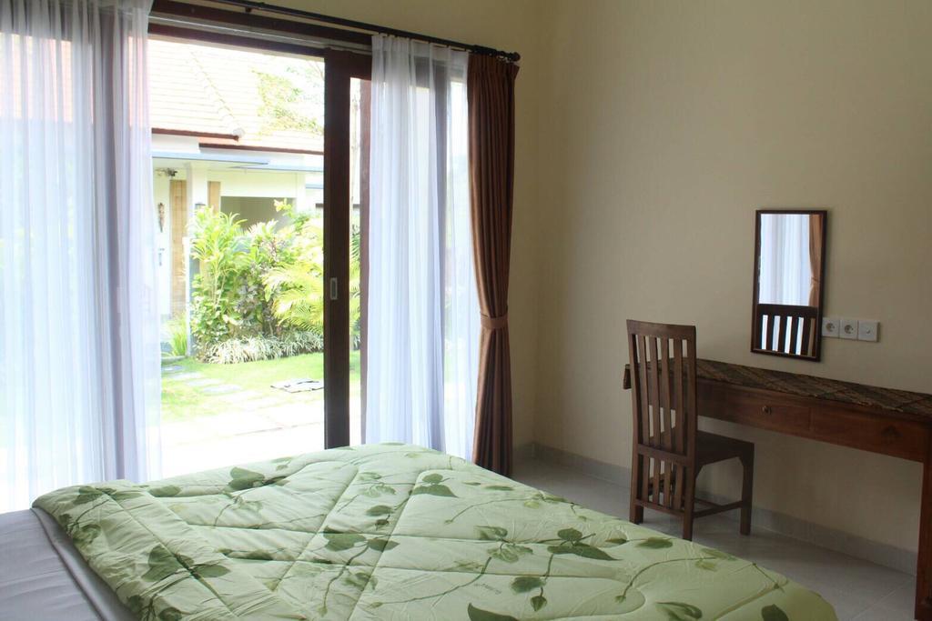 Purnama Guesthouse Canggu Екстериор снимка